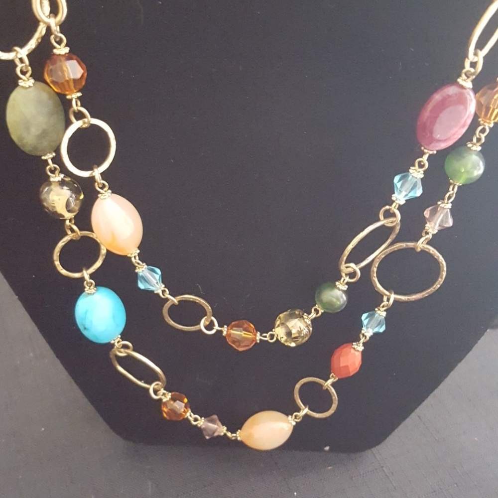 Goldtone long multi stone necklace with clasp